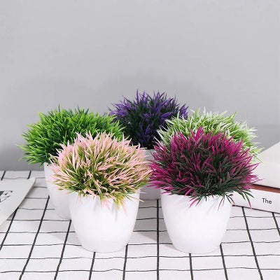 Lot de quatre planstes artificielles de differentes couleurs